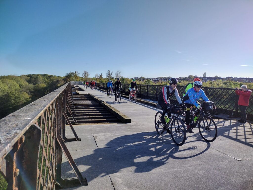 A group of cyclists on the viaduct.